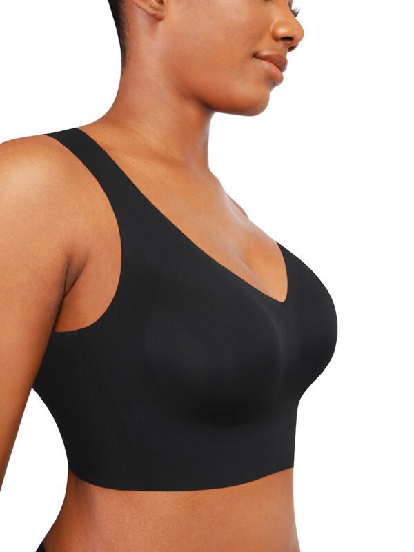 A woman wearing a black bra with no padding.