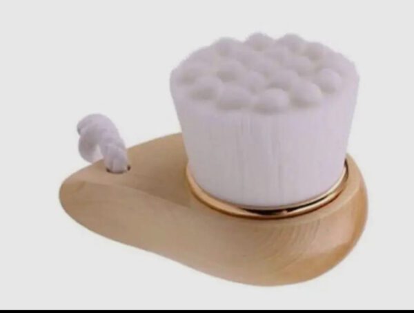 A wooden holder with some white stuff on it