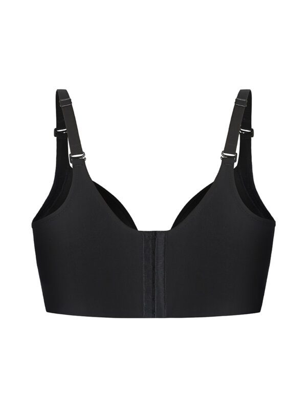 A black bra with straps on top of it.