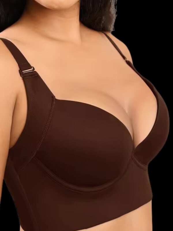 A woman in a brown bra and black panties.