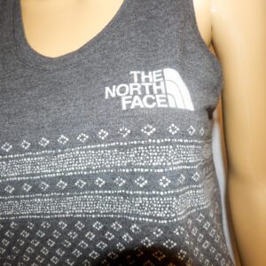 A close up of the front of a woman 's shirt