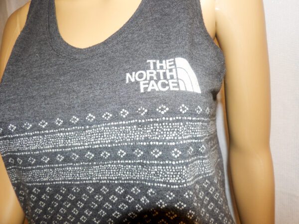 A close up of the front of a woman 's shirt