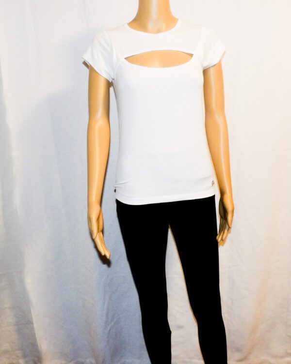 A mannequin wearing black pants and white shirt.