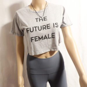 A mannequin wearing tight pants and a crop top.