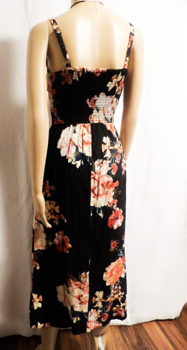 A black dress with flowers on it