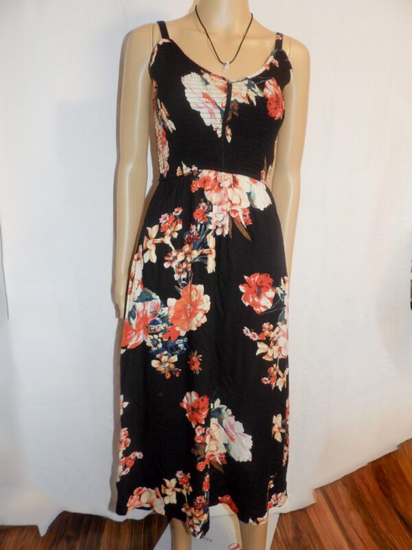 A black dress with flowers on it