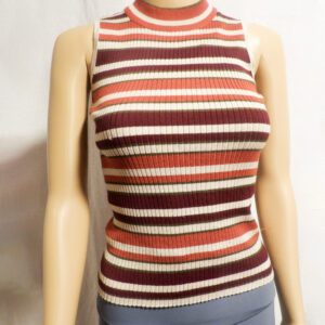 A mannequin wearing a striped sweater and jeans.