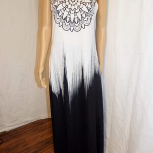 A black and white dress with a lace design on the front.