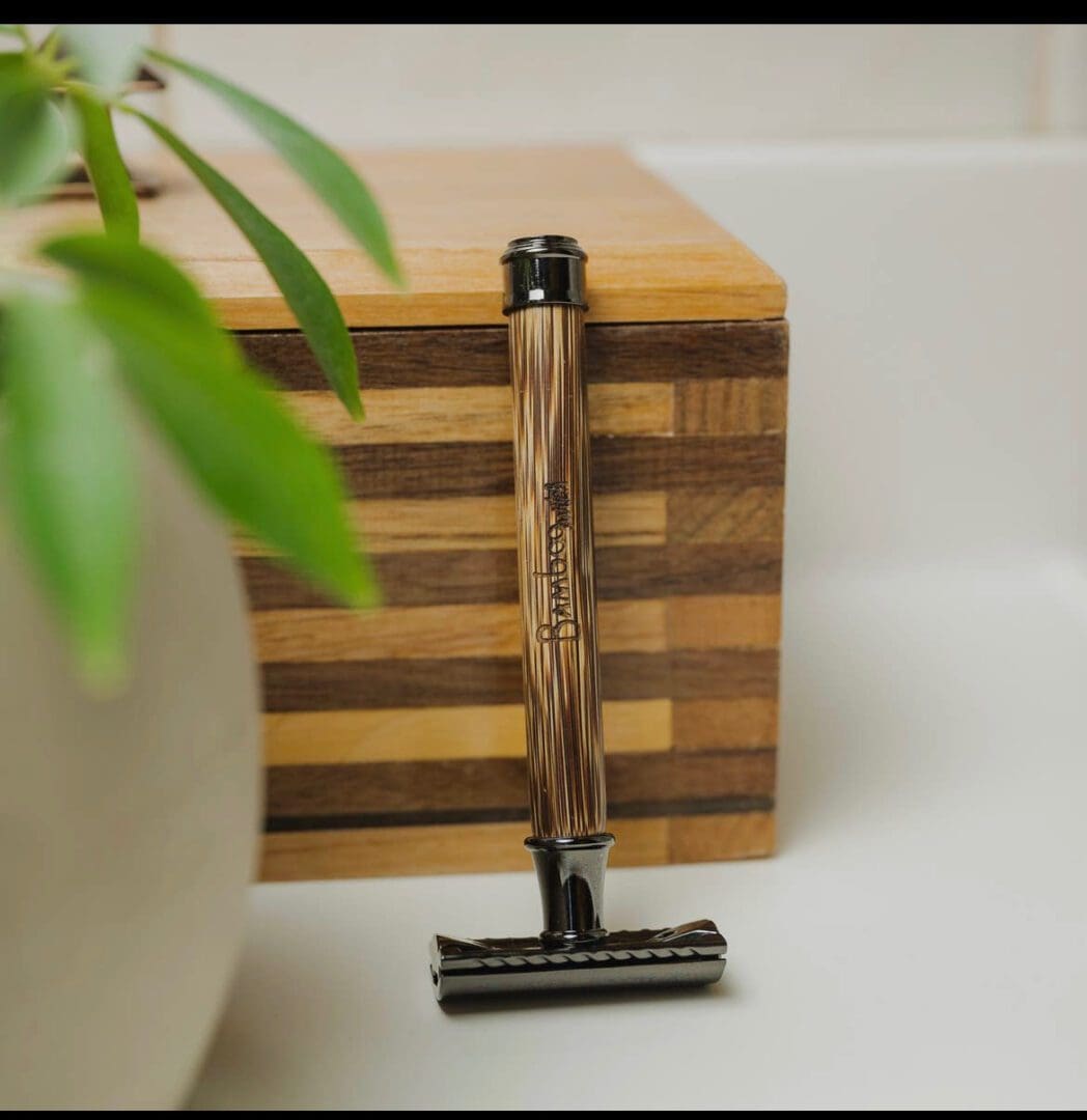 A wooden razor sitting on top of a counter.