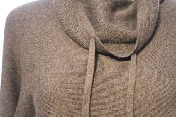 A close up of the hood on a sweater.