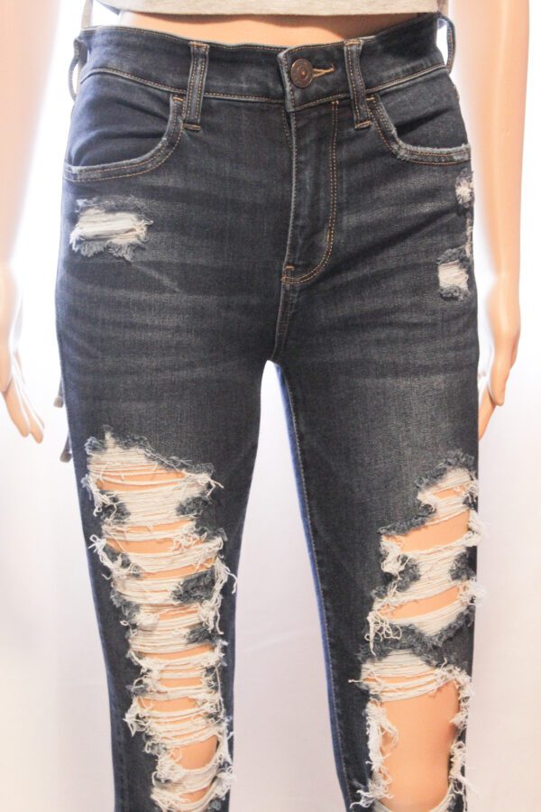 A pair of jeans that are torn up.