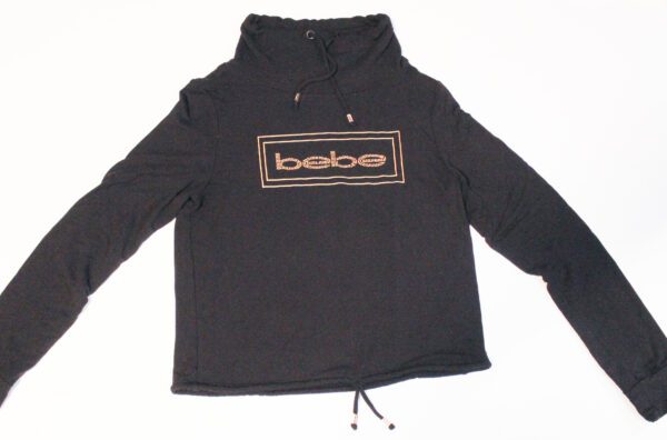 A black jacket with the word bebe on it.