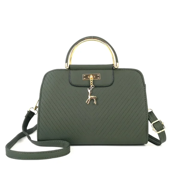 A green purse with a deer on the handle.