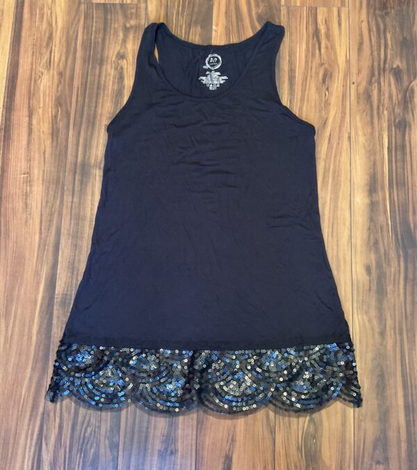 A black tank top with lace trim on the bottom.