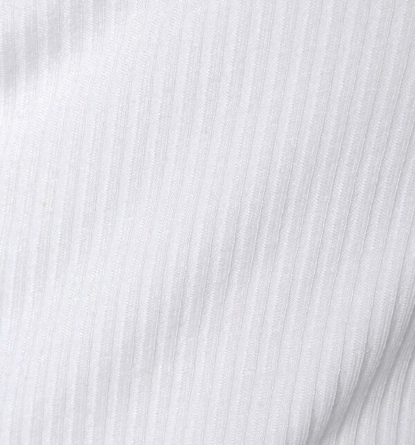 A close up of the fabric for a white shirt