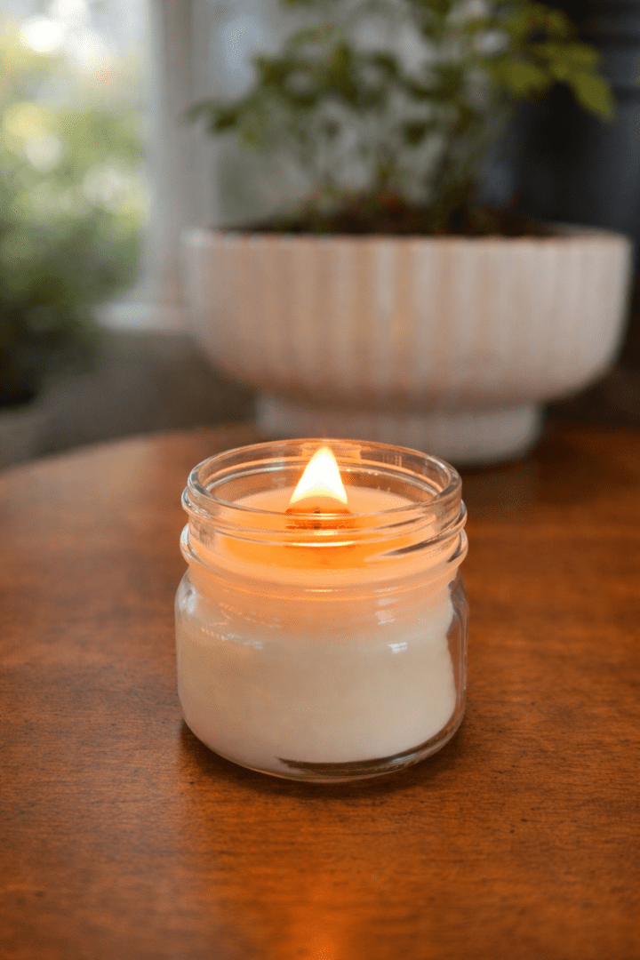 avender Haven candle burning with wood wick soft flame
